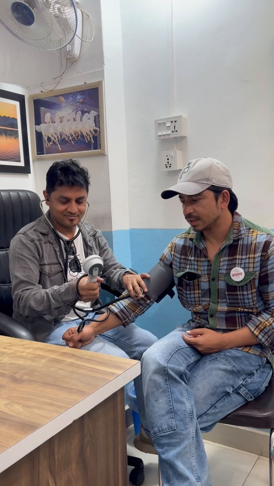 Dr. Sagar Pokherel checking a guest's health